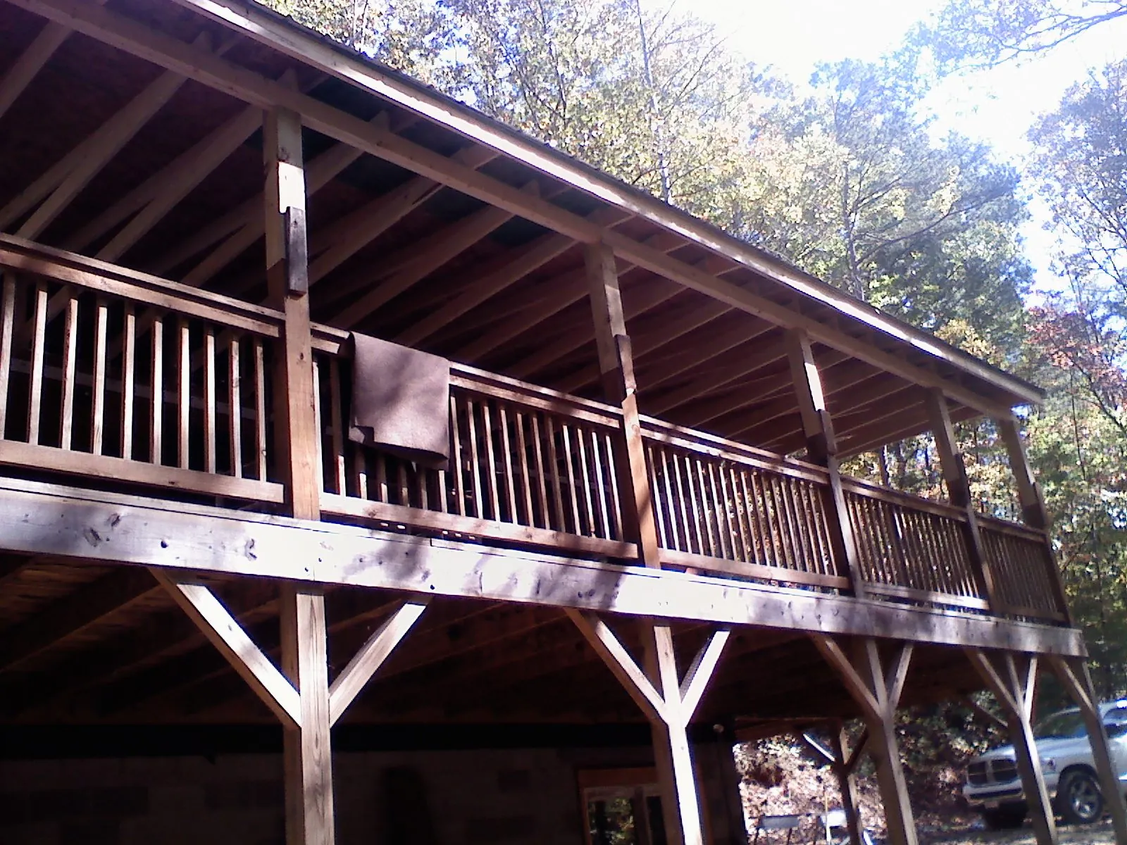 Timber framing under a new elevated porch and deck — Roof Leak Repair in Browns Summit by Roofing Brothers